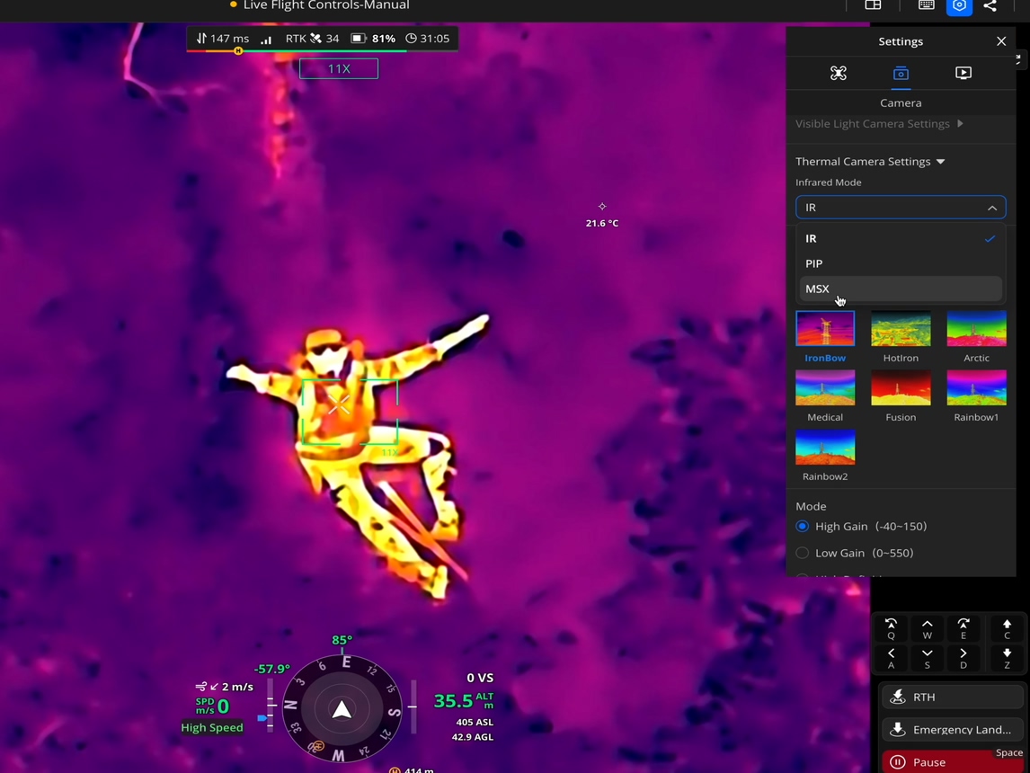 Thermal drone view locating a person in an incident area, from official DJI FlightHub 2 imagery.
