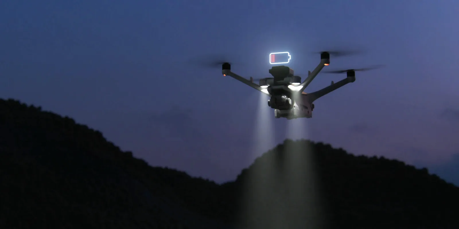DJI Matrice 4TD flying an automated night patrol, using night-scene imaging and NIR auxiliary light over a utility yard.