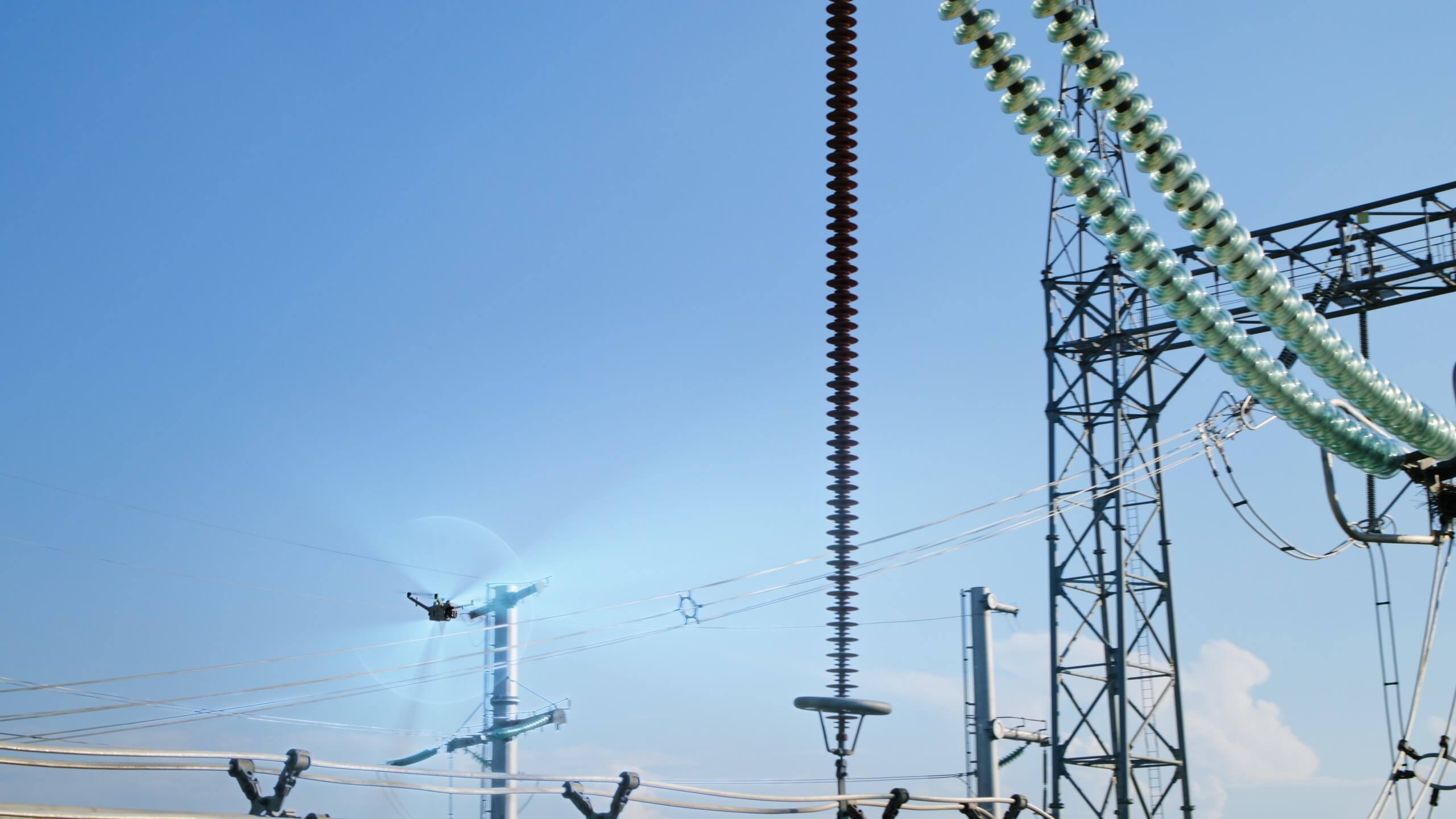 DJI Matrice 5TD flying at a substation in official DJI launch imagery.