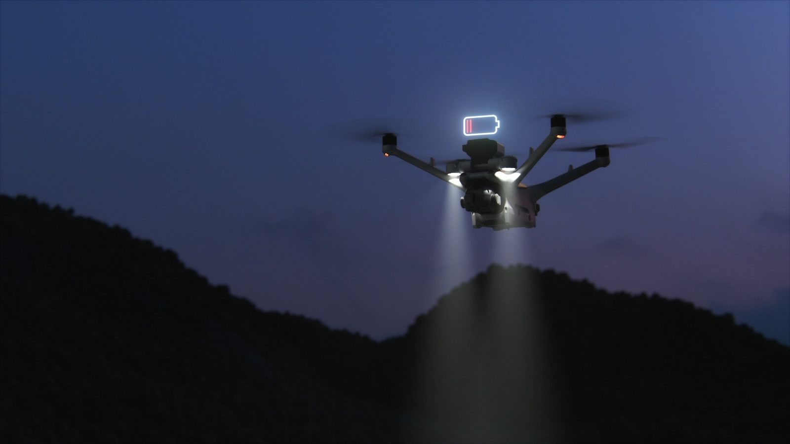 Enterprise drone flying at night with its spotlight illuminating terrain during an emergency response flight.