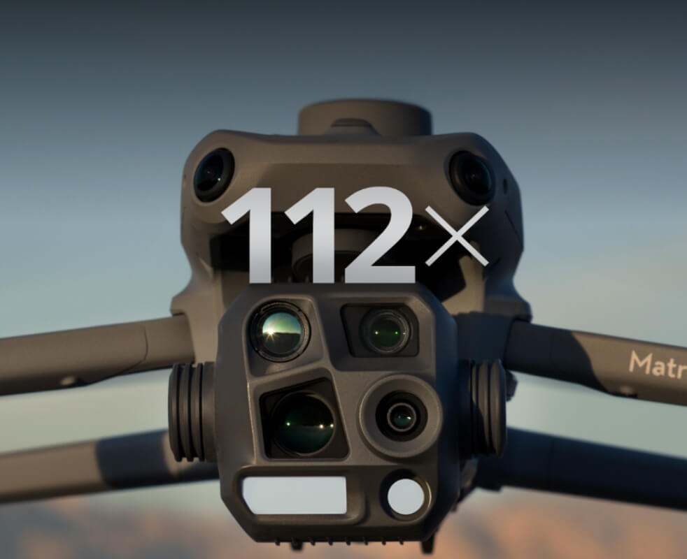 DJI Matrice 4E multi-sensor camera array with 4/3-inch mapping camera, medium-tele, and tele lenses, showing 112x hybrid zoom badge.