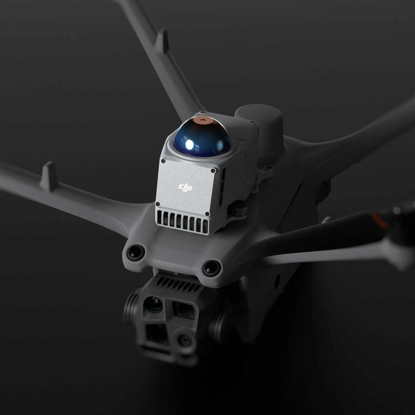 Docked DJI Matrice 4 series aircraft — IP55 weather-hardened drone flown autonomously by the DJI Dock 3 for recurring RTK survey missions.