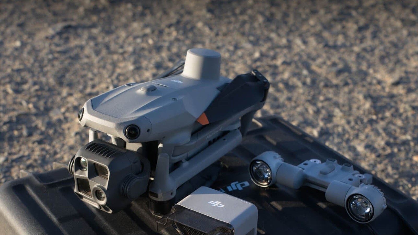 DJI Matrice enterprise drone flying with its inspection camera visible.